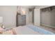 Bright bedroom with dresser, closet, and comfortable bed at 1261 Arnhem Dr, Hampton, GA 30228