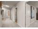 Hallway with doors to bedrooms and bathrooms at 1261 Arnhem Dr, Hampton, GA 30228