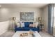 Loft area with blue sofa and coffee table at 1261 Arnhem Dr, Hampton, GA 30228