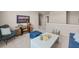 Spacious loft with sitting area and media console at 1261 Arnhem Dr, Hampton, GA 30228