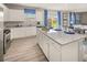 Open concept kitchen with large island and stainless steel appliances at 1261 Arnhem Dr, Hampton, GA 30228