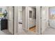 Hallway with doors to bedrooms and bathroom at 1261 Arnhem Dr, Hampton, GA 30228