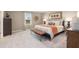 Large main bedroom with carpeted floors and ensuite bathroom at 1261 Arnhem Dr, Hampton, GA 30228