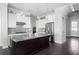 Modern kitchen with granite island and stainless steel appliances at 244 Rope Mill Rd, Woodstock, GA 30188