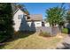 Landscaped backyard with a gray privacy fence at 244 Rope Mill Rd, Woodstock, GA 30188