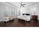 Spacious main bedroom with hardwood floors and ample natural light at 244 Rope Mill Rd, Woodstock, GA 30188