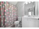 Clean bathroom with shower/tub, toilet and white vanity at 244 Rope Mill Rd, Woodstock, GA 30188