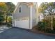 Gray house exterior with white garage door at 244 Rope Mill Rd, Woodstock, GA 30188