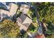 Aerial view of a house and surrounding neighborhood at 244 Rope Mill Rd, Woodstock, GA 30188