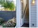 Exterior view of home showing stairs and landscaping at 244 Rope Mill Rd, Woodstock, GA 30188