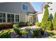 Private patio with seating area, surrounded by lush greenery at 244 Rope Mill Rd, Woodstock, GA 30188