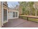 Spacious back deck overlooks a wooded backyard at 2582 Fairview Ln, Jonesboro, GA 30236