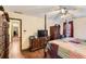 Bedroom with king-size bed, dresser, and access to hallway at 2582 Fairview Ln, Jonesboro, GA 30236