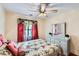 Bedroom with a queen-size bed, dresser, and mirror at 2582 Fairview Ln, Jonesboro, GA 30236