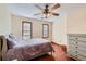 Bedroom with a queen-size bed and neutral bedding at 2582 Fairview Ln, Jonesboro, GA 30236