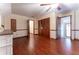 Bedroom with hardwood floors, a ceiling fan, and access to hallway at 2582 Fairview Ln, Jonesboro, GA 30236