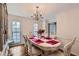 Formal dining room with hardwood floors and ornate furniture at 2582 Fairview Ln, Jonesboro, GA 30236