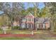 Brick house with a two-car garage and manicured lawn at 2582 Fairview Ln, Jonesboro, GA 30236