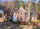 Brick house exterior with black shutters and a manicured lawn at 2582 Fairview Ln, Jonesboro, GA 30236