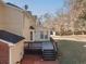 Back of house showing deck and patio at 2582 Fairview Ln, Jonesboro, GA 30236