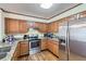 Kitchen boasts stainless steel appliances and granite countertops at 2582 Fairview Ln, Jonesboro, GA 30236