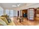 Sunroom with hardwood floors, French doors, and access to the outdoors at 2582 Fairview Ln, Jonesboro, GA 30236