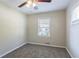 Bedroom with ceiling fan, neutral walls, and carpet flooring at 2775 Tilson Rd, Decatur, GA 30032