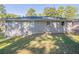 Brick house exterior with a grassy backyard at 2775 Tilson Rd, Decatur, GA 30032