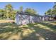 Side view of a brick house with a yard at 2775 Tilson Rd, Decatur, GA 30032