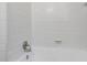 White tiled bathtub and shower combo at 2775 Tilson Rd, Decatur, GA 30032