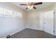 Bedroom with ceiling fan, neutral walls, carpet, and closet at 2775 Tilson Rd, Decatur, GA 30032