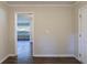 Bright entryway with dark wood-look floors, leading to living room at 2775 Tilson Rd, Decatur, GA 30032