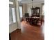 Formal dining room with hardwood floors and a large table at 165 Summit Point Dr, Fayetteville, GA 30214