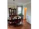 Dining room with hardwood floors and a china cabinet at 165 Summit Point Dr, Fayetteville, GA 30214
