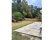 Spacious backyard with patio and wooded area at 165 Summit Point Dr, Fayetteville, GA 30214