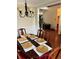 Dining room with hardwood floors and a wood table at 165 Summit Point Dr, Fayetteville, GA 30214