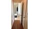 View into bathroom with tub and hardwood floors at 165 Summit Point Dr, Fayetteville, GA 30214