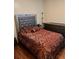 Spacious bedroom with a large bed and dresser at 165 Summit Point Dr, Fayetteville, GA 30214