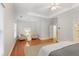 Main bedroom sitting area with hardwood floors at 4280 Kingston Gate Cv, Chamblee, GA 30341