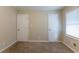 Spacious bedroom with two closets and window at 6168 Ellis St, Douglasville, GA 30134
