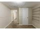 Finished basement area with closet and built-in shelves at 6168 Ellis St, Douglasville, GA 30134