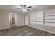 Living room with hardwood floors and built-in shelving at 6168 Ellis St, Douglasville, GA 30134