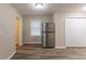 Kitchen features stainless steel refrigerator and pantry at 6168 Ellis St, Douglasville, GA 30134