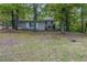 Ranch home exterior with tree-lined yard at 6168 Ellis St, Douglasville, GA 30134