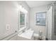 Updated bathroom with vanity, toilet, and shower at 1618 Belmont Sw Ave, Atlanta, GA 30310