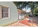 Home features a brick patio and fenced backyard at 1618 Belmont Sw Ave, Atlanta, GA 30310