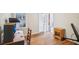 Home office with hardwood floors, window, and workspace at 1618 Belmont Sw Ave, Atlanta, GA 30310
