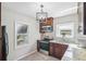 Updated kitchen with wood cabinets, granite counters, and stainless steel appliances at 1618 Belmont Sw Ave, Atlanta, GA 30310