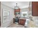 Modern kitchen with wood cabinets, granite countertops and stainless steel appliances at 1618 Belmont Sw Ave, Atlanta, GA 30310