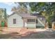 Backyard view of the home with patio and basketball goal at 1618 Belmont Sw Ave, Atlanta, GA 30310